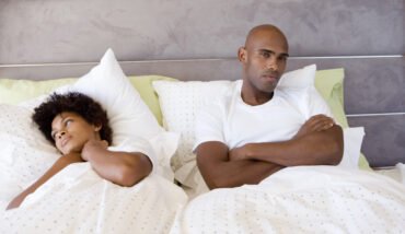 Relationship advice couple upset in bed